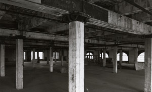 The empty sixth floor of the former Texas School Book Depository building as it appeared in the 1980s, before the museum opened. 